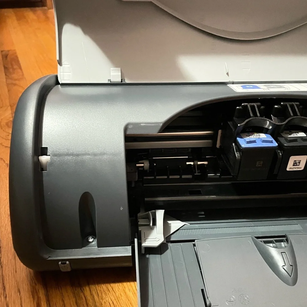 HP Deskjet Printer with Blue and Orange Box
